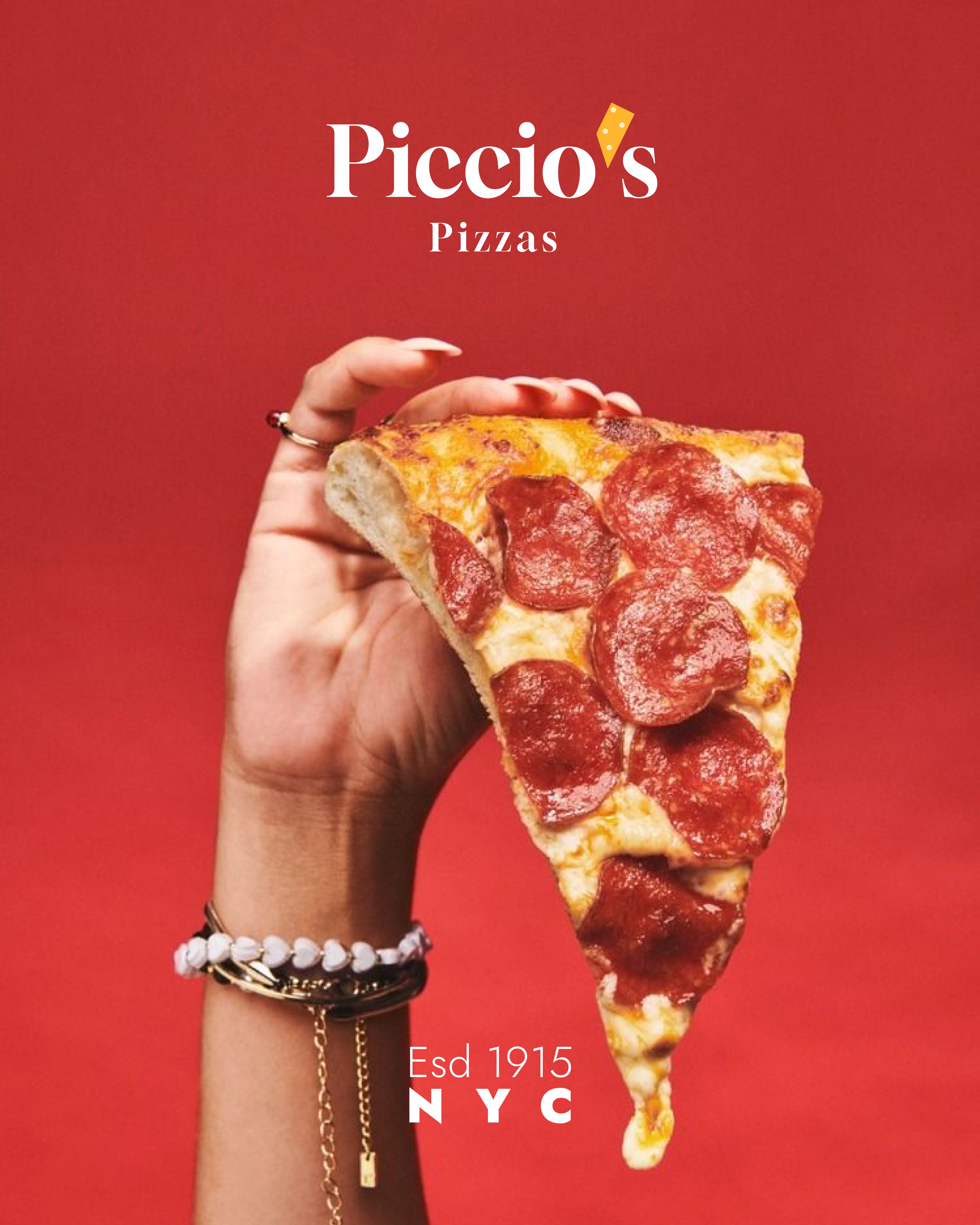 Piccio's Pizzas hand holding pizza slice
